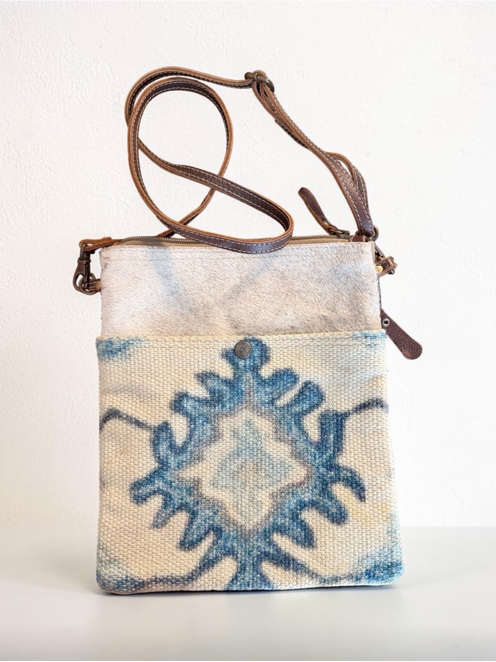 Canvas Crossbody Bag with Blue Ikat Pattern and Brown Leather Strap